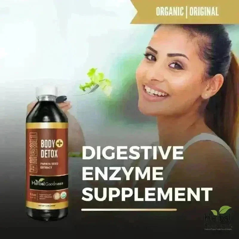 A dark brown body+ detox bottle with gold and black label held in hand from herbal goodness effective detox starter